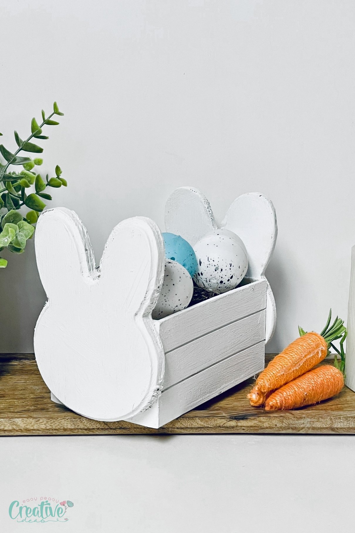 If you're looking for the perfect way to add charm to your farmhouse Easter décor, this farmhouse bunny crate is a simple yet stunning DIY project